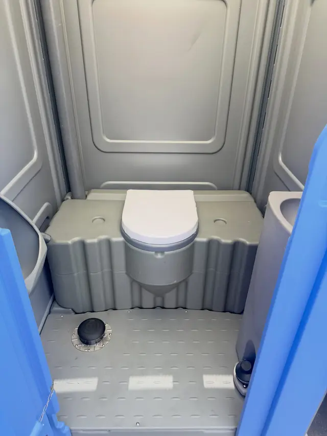 Spacious porta potty interior