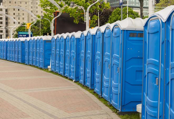 a row of portable restrooms at a fairground, offering visitors a clean and hassle-free experience in jal